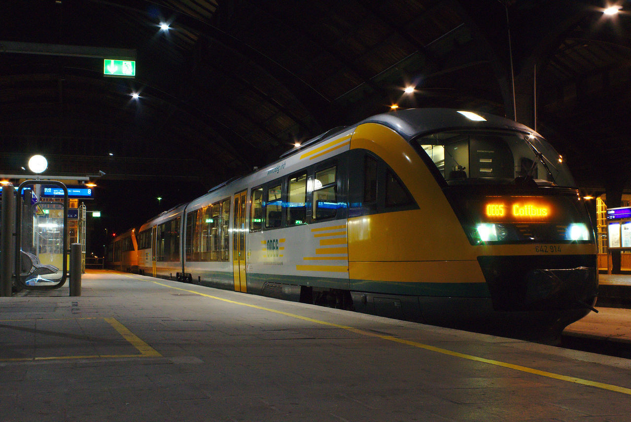 ILLUMINATED RAILROAD STATION AT NIGHT