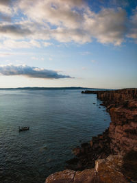 Scenic view of sea against sky, lighthouse mangiabarche