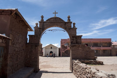 Entrance of historic building against sky