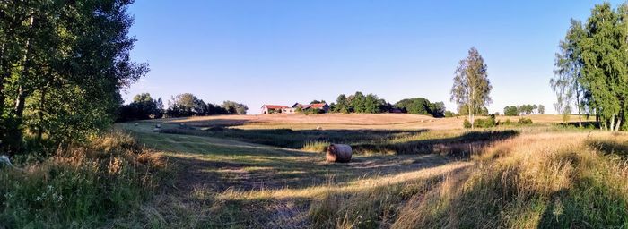 Scenic view of land against clear sky