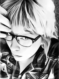 Close-up portrait of boy wearing hat