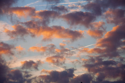 Low angle view of dramatic sky during sunset