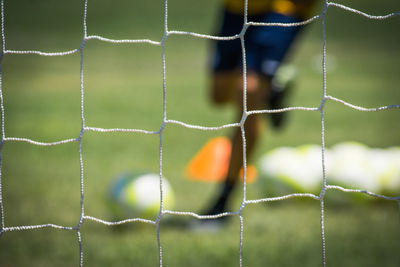 Close-up of soccer ball on field