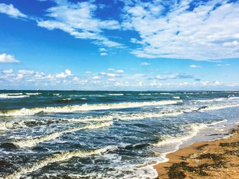 Scenic view of beach against sky