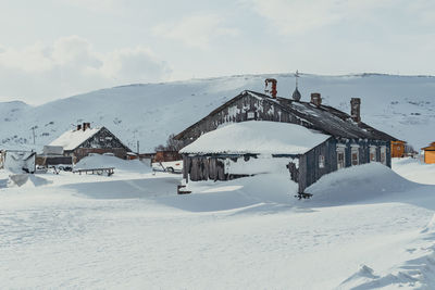 Scenic view of snow covered mountain against sky