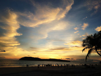 View of beach at sunset