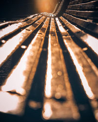 Close-up of illuminated railing at night