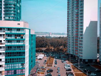 Modern buildings in city against sky