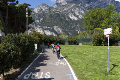 Cyclists on a trail in the dolomites