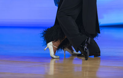 Low section of woman standing on floor