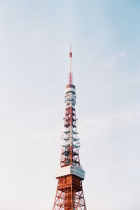 Low angle view of communications tower against sky