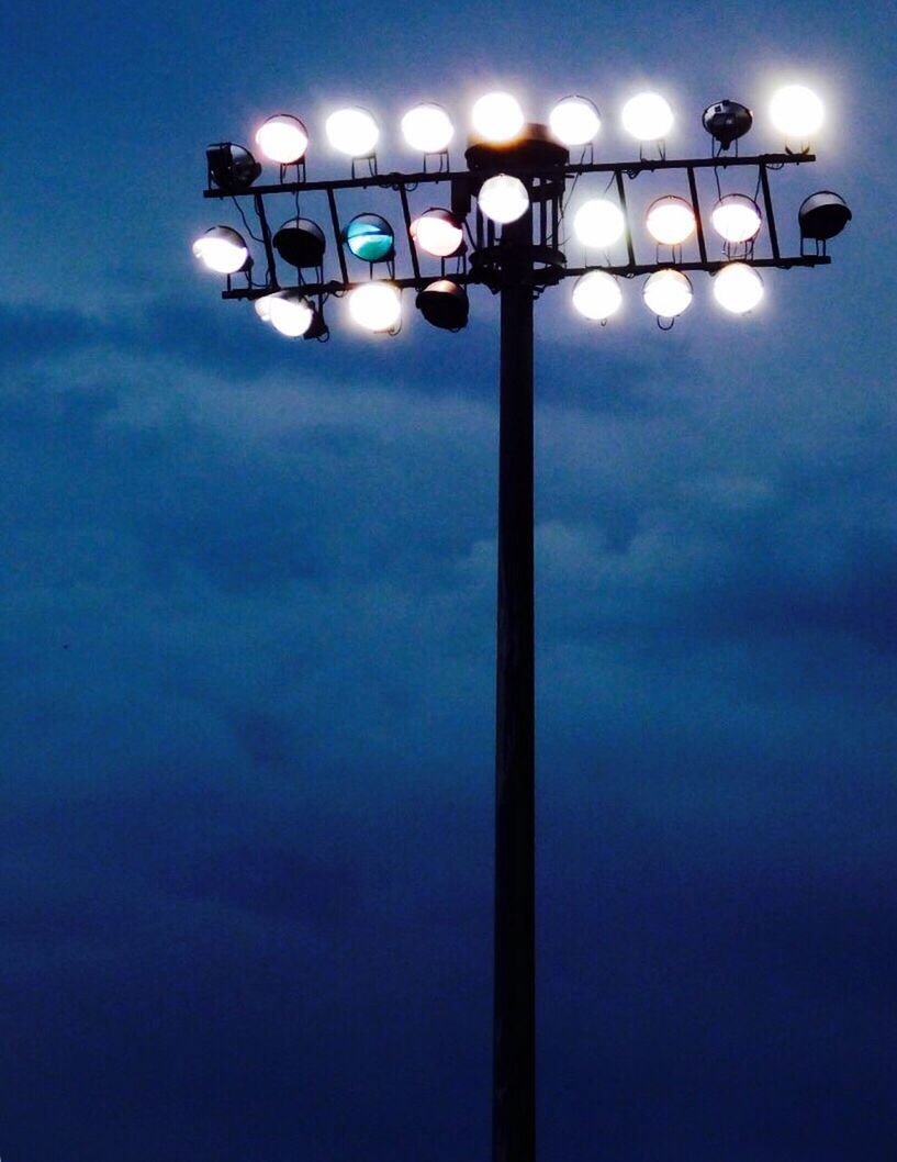 illuminated, lighting equipment, street light, electricity, dusk, sky, cloud, multi colored, moody sky, electric light, in a row, atmospheric mood, outdoors, scenics, high section, lit, cloudscape, tranquility, no people