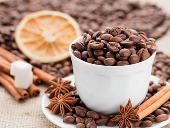 Close-up of coffee beans on table