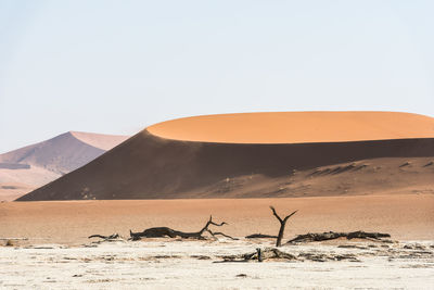 Scenic view of desert against clear sky