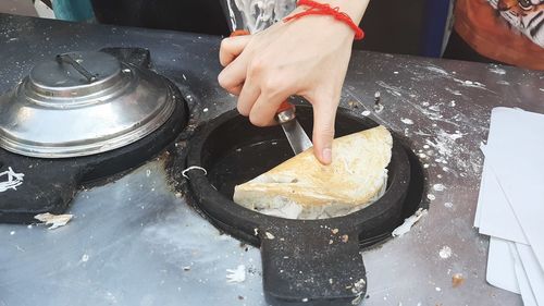 High angle view of person preparing food