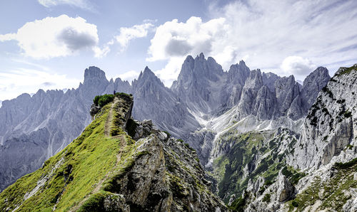 Scenic view of rocks and italian mountains against sky - cadini di misurina