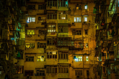 Full frame shot of illuminated buildings at night