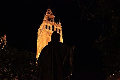 Low angle view of illuminated building at night