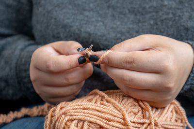 Close-up of baby hand holding hands