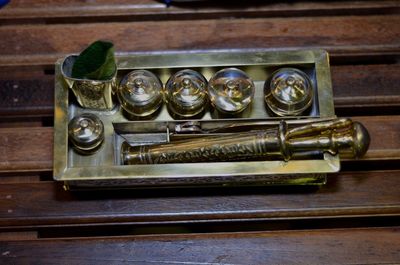 High angle view of old objects on table