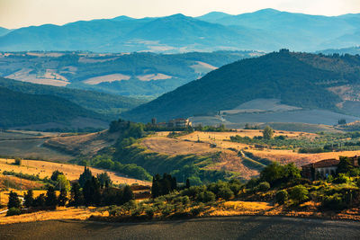 Scenic view of field against mountains