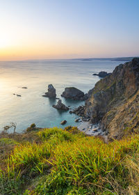 Scenic view of sea against sky during sunset