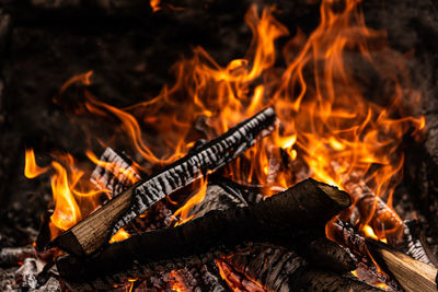 Close-up of fire burning at night