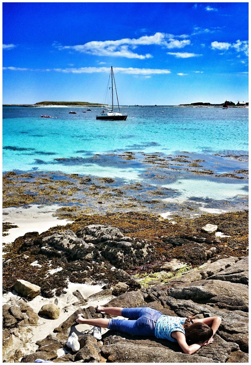 water, sea, nautical vessel, sky, transportation, beach, boat, mode of transport, horizon over water, moored, shore, tranquility, tranquil scene, sand, scenics, beauty in nature, nature, blue, transfer print, sailboat