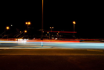 Light trails on road at night