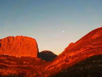 Scenic view of mountain against sky during sunset