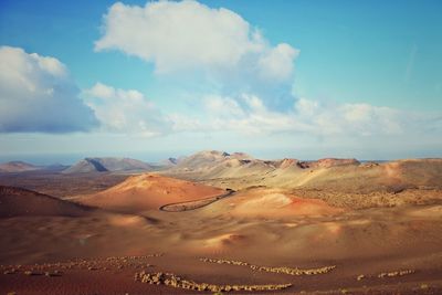 Scenic view of desert against sky