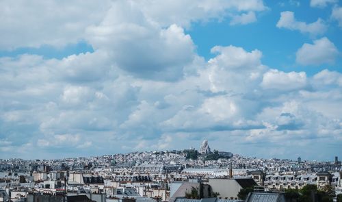 Panoramic view of cityscape against sky