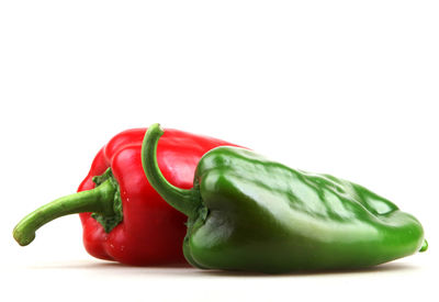 Close-up of red bell pepper against white background