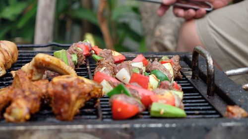 Close-up of meat on barbecue grill