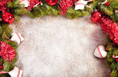 High angle view of snow amidst christmas ornaments