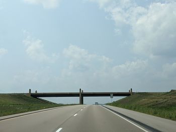 Empty road along landscape