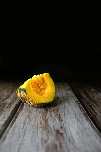 Close-up of yellow fruit on table