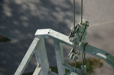 Close-up of rope tied to bollard