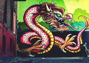 Full frame shot of multi colored graffiti on wall