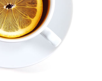 Close-up of coffee cup against white background