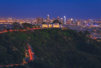 Illuminated cityscape at night