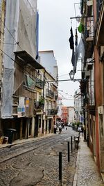 Street in city against sky