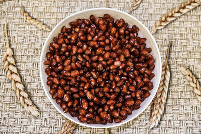 High angle view of coffee beans in bowl