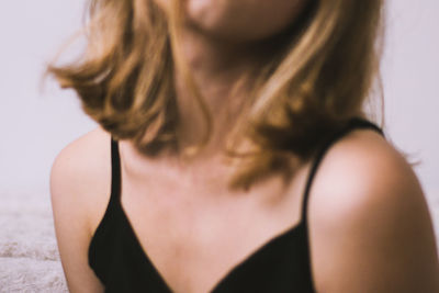 Midsection of woman wearing black clothing