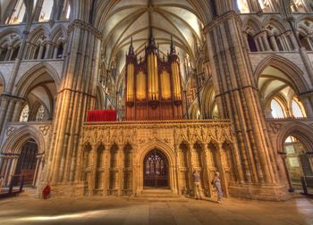 Group of people in front of historic building