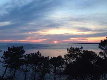 Scenic view of sea at sunset