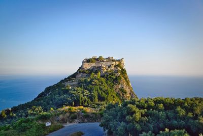 Scenic view of sea against clear blue sky