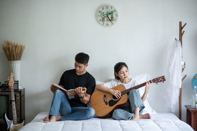 Young man playing guitar