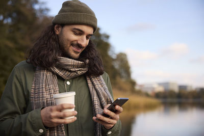 Young woman using mobile phone