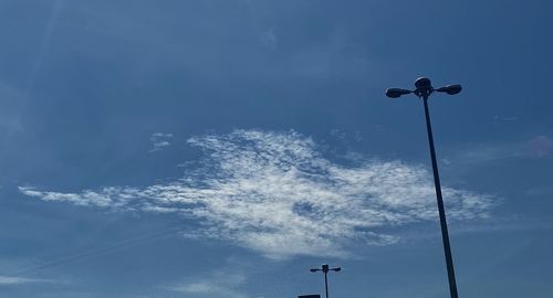 Low angle view of street light against sky